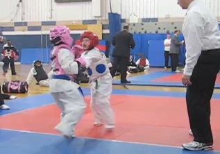 Alex's first karate tournament: first sparring match